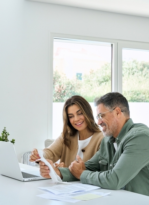 couple asking questions on computer